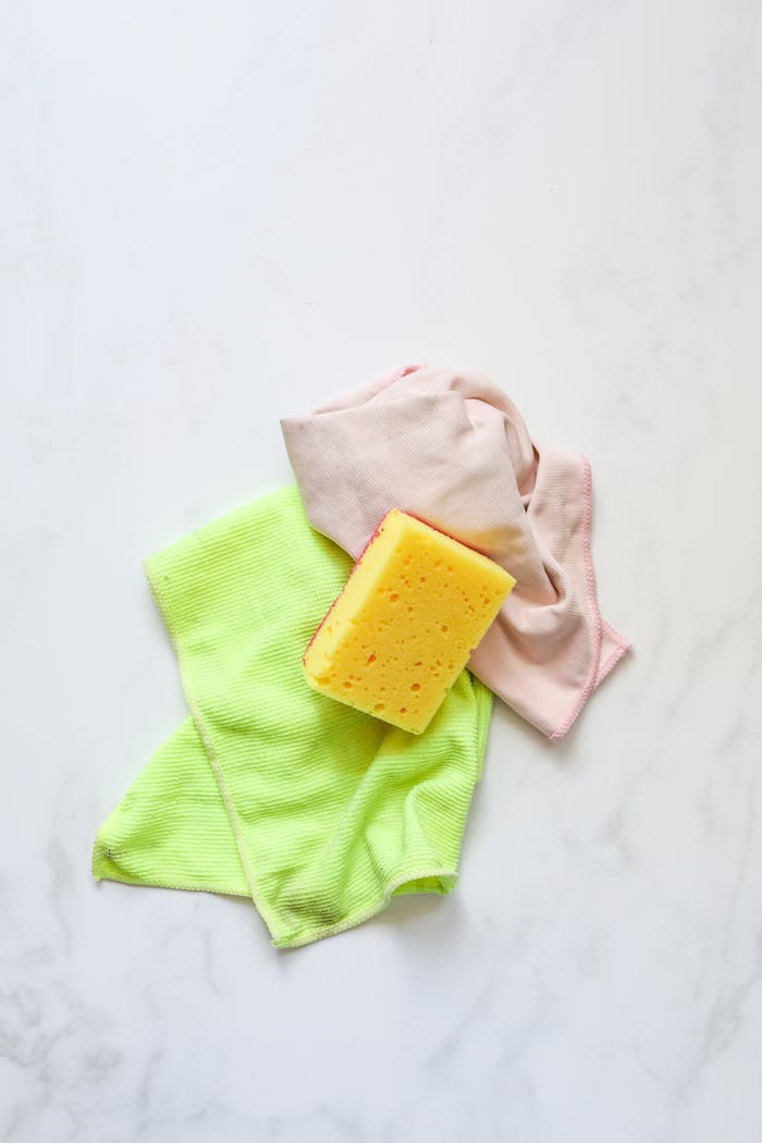 pexels-photo-4440527 A Yellow Sponge over Cleaning Cloth